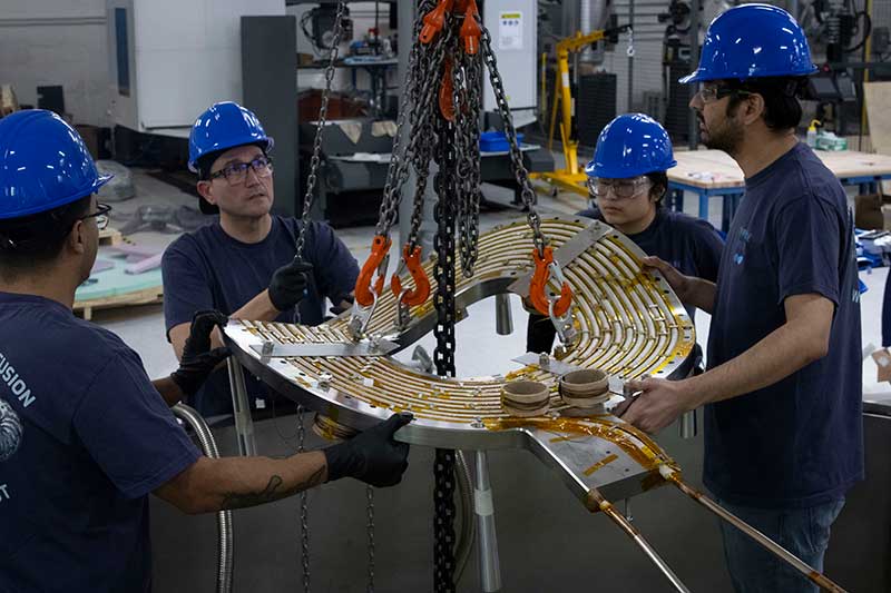 Engineers at Type One Energy’s magnet development facility work on a high?temperature superconducting magnet prototype.